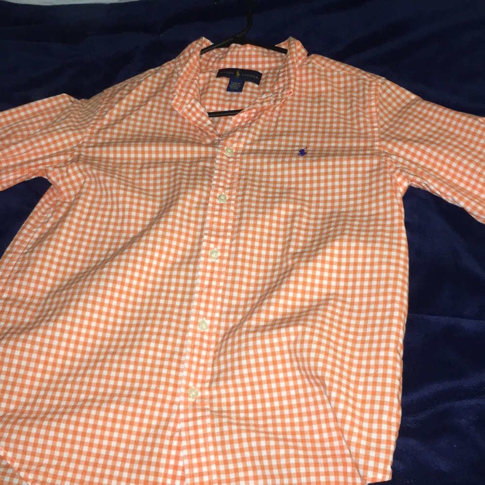 Orange polo shirt.